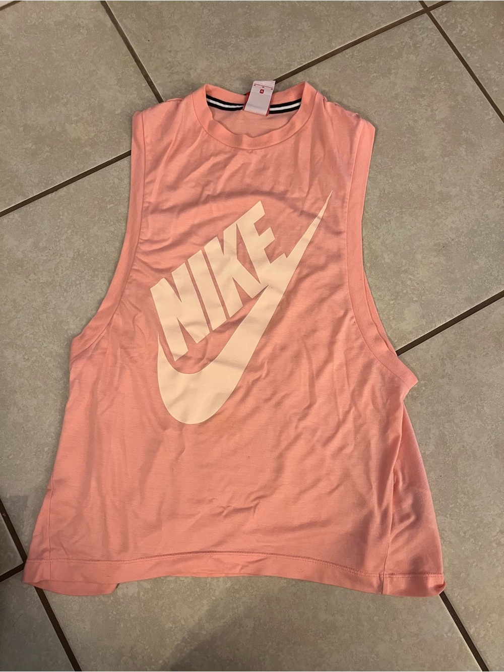 Nike Women’s Coral Pink Muscle Tank with White Swoosh size medium